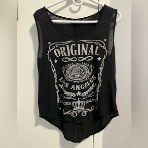 A rockstar made tanktop that has seen the most of bars